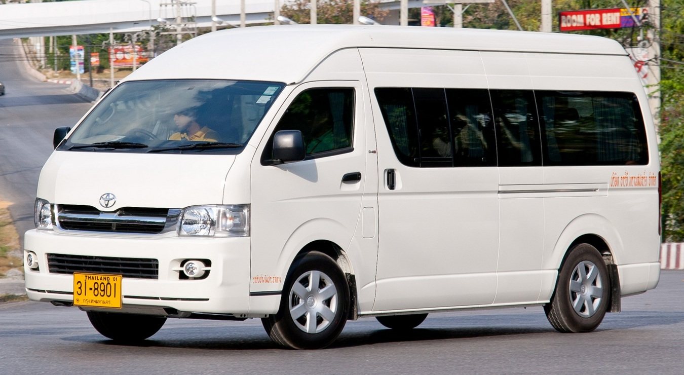 White Toyota Hiace van of the type used for airport transfers