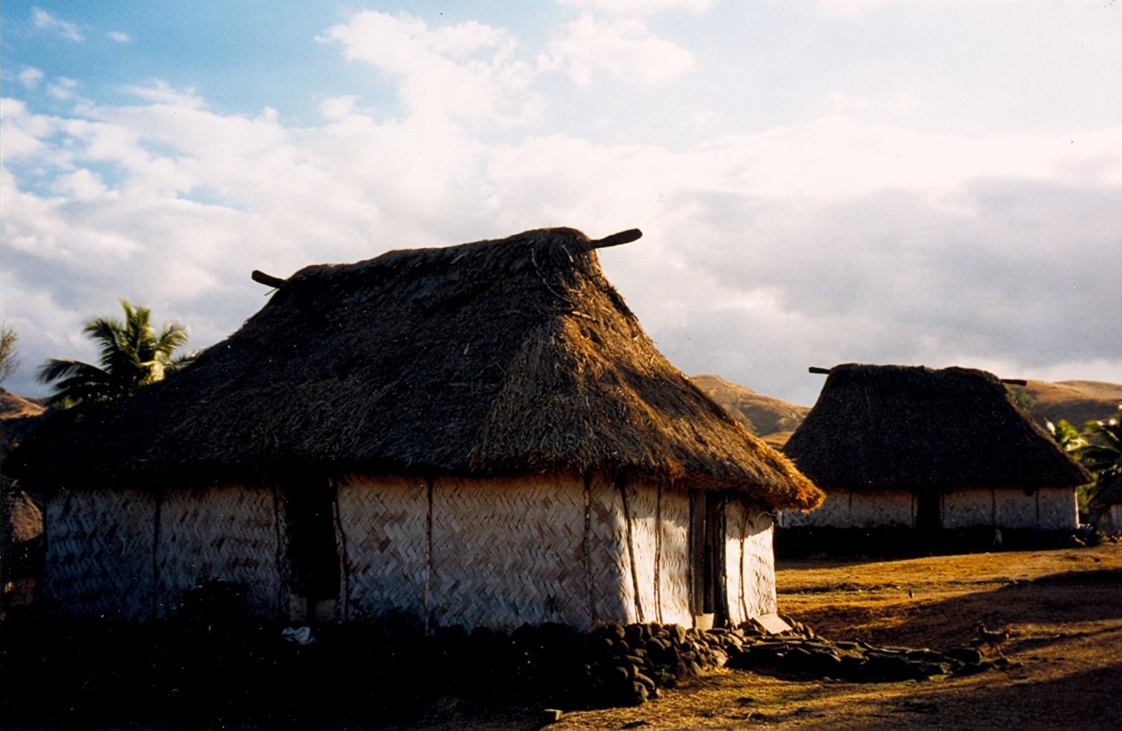 Thatched bure houses in a Fijian highland village